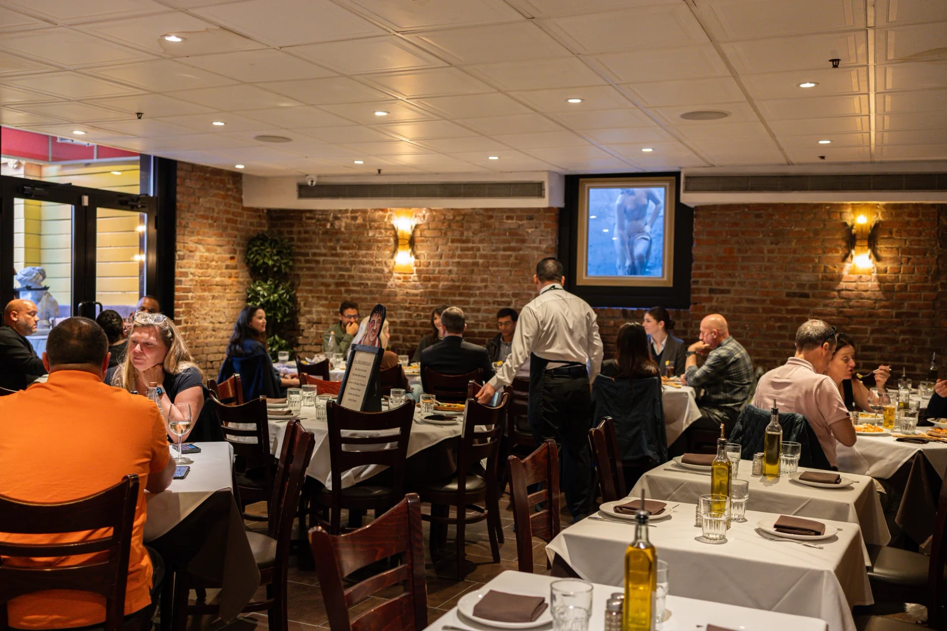 A full dining room of guests at Da Nico Ristorante in Little Italy