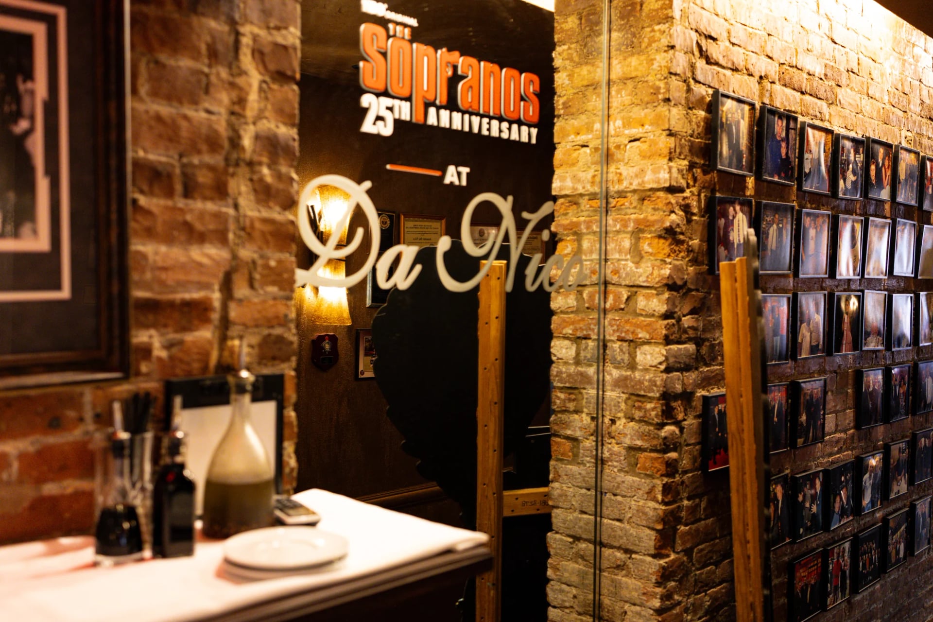 Sopranos 25th anniversary poster in the entry corridor at Da Nico Ristorante on Mulberry Street